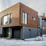 TETT: Det gamle huset forbindes med det nye via et mellombygg. FOTO: NRB Scanpix