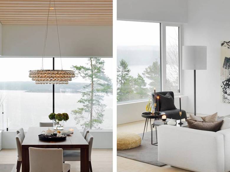KASTER GLANS: Lampen lyser ned på bordet med brede planker i mørkt tre. Store glassflater ned mot fjorden gir en fantastisk utsikt. FOTO: Studio Dreyer Hensley
